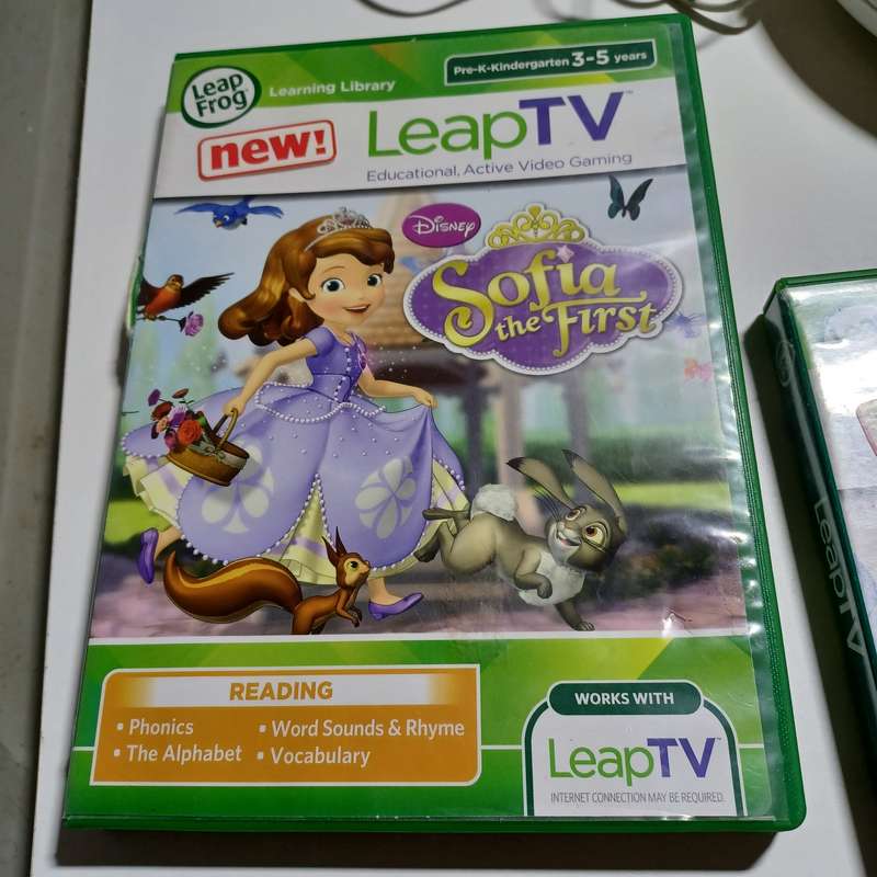 LeapFrog LeapTV Educational Video Gaming System with 4 games / see description