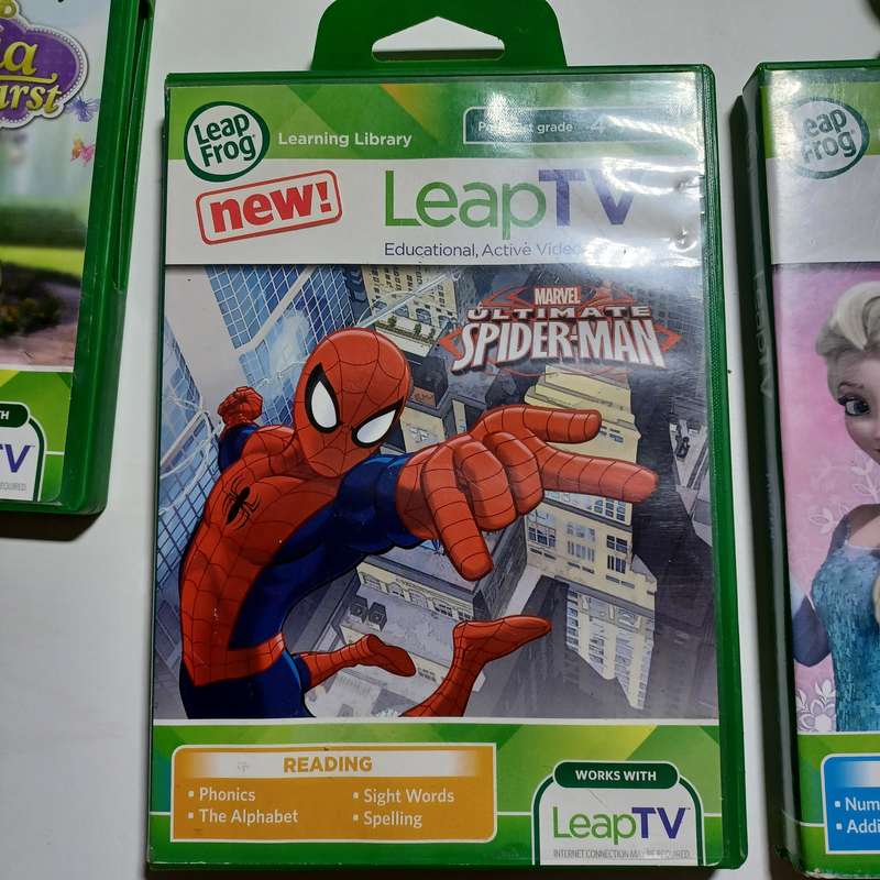 LeapFrog LeapTV Educational Video Gaming System with 4 games / see description