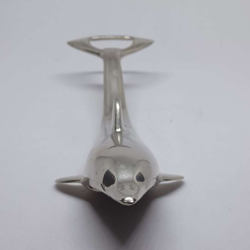 Vintage chrome dolphin bottle opener