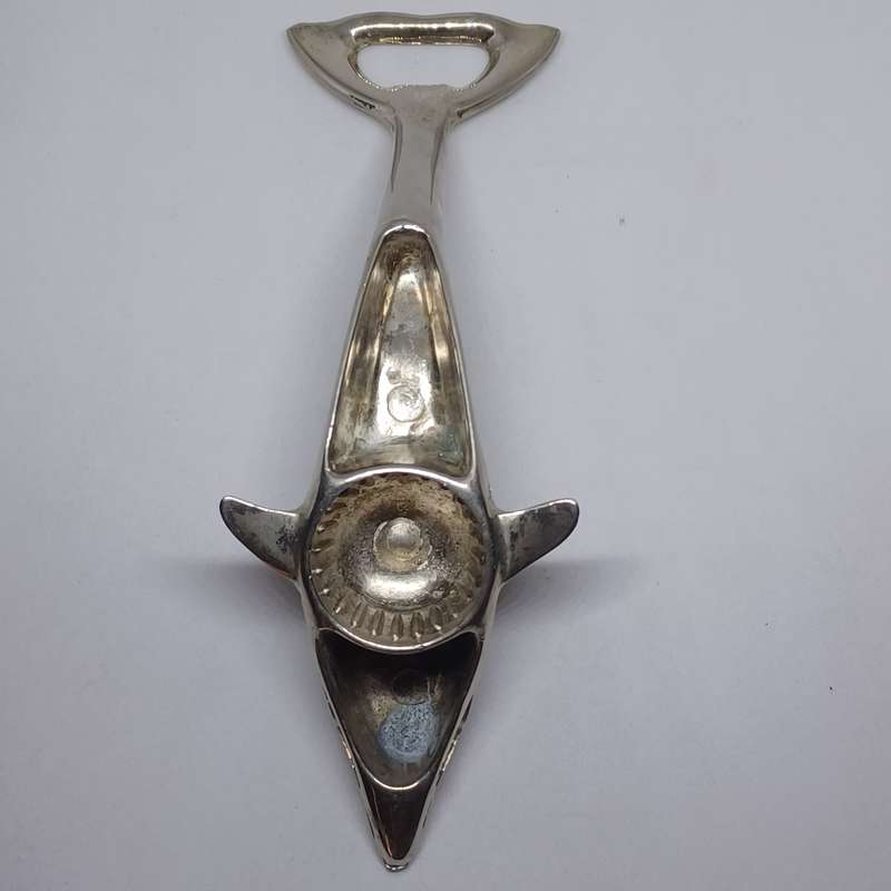 Vintage chrome dolphin bottle opener