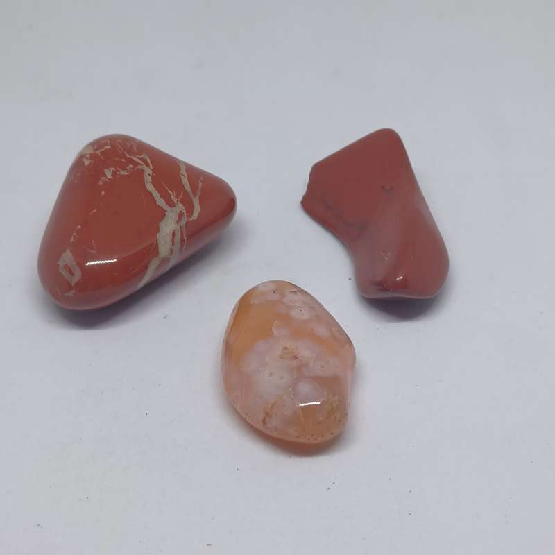 2 x red jasper tumble stones (total weight - 52.5g) and 1  x flower plume agate (weight - 13.8g)