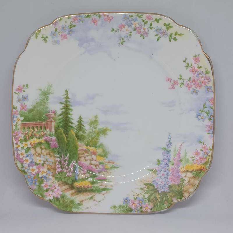 Vintage Royal Albert china featuring the "Kentish Rockery" pattern side plate