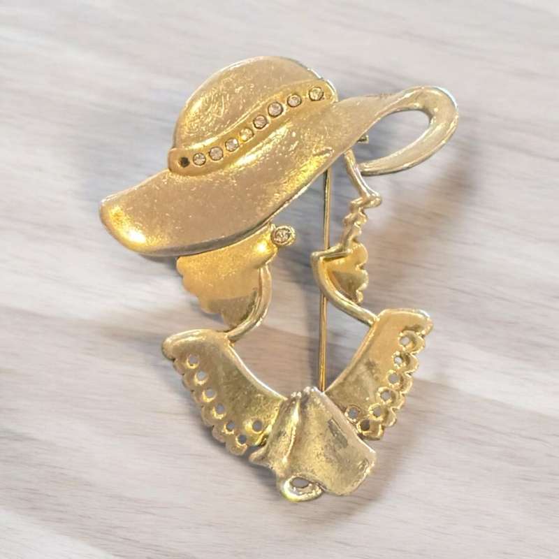 Lady silhouette brooch