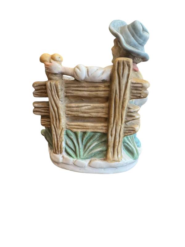 Old man on bench ornament