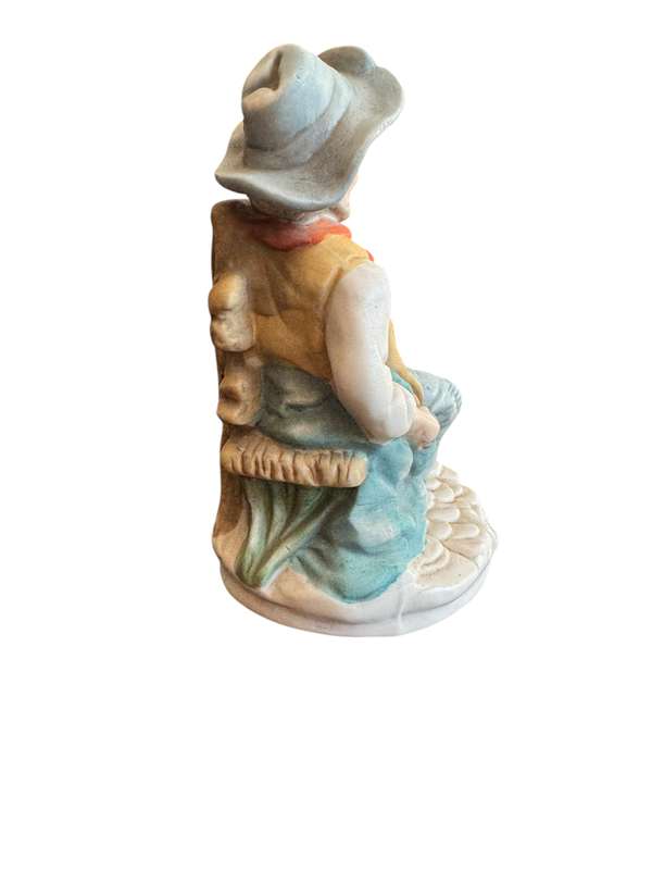 Old man on bench ornament