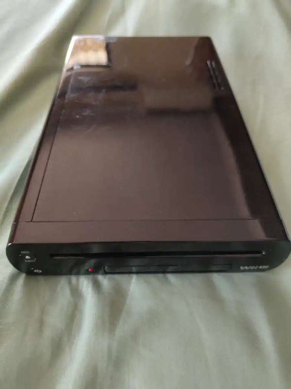 Nintendo Wii U Deluxe and Games