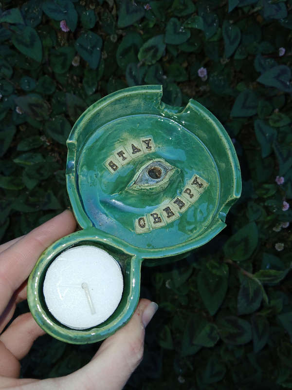 Handmade Ceramic ashtray / candle holder (stay creepy)