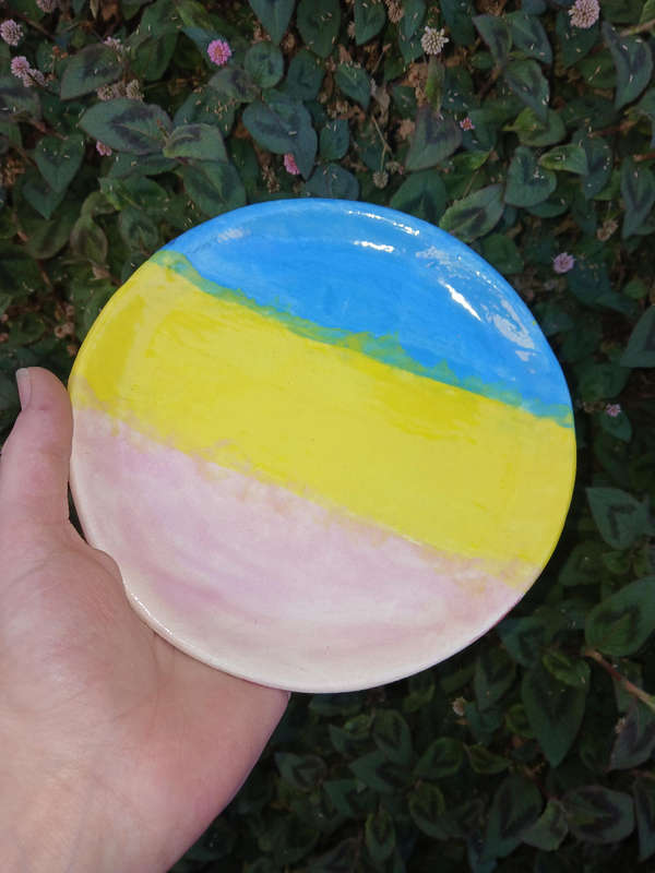 Handmade blue, yellow and purple plate