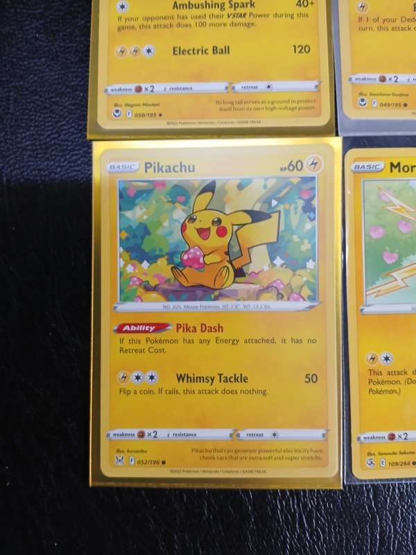Pokémon Trading Cards featuring Pikachu, Raichu, and Morpeko + Flying Pikachu V  Gold Foil