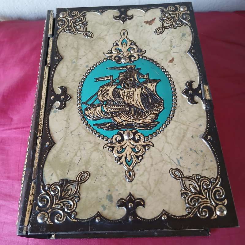 Vintage Book-shaped tin box with embossed sailing ship, treasure chest