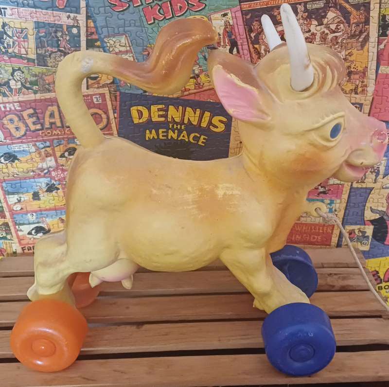 Vintage Rolling Cow Toy