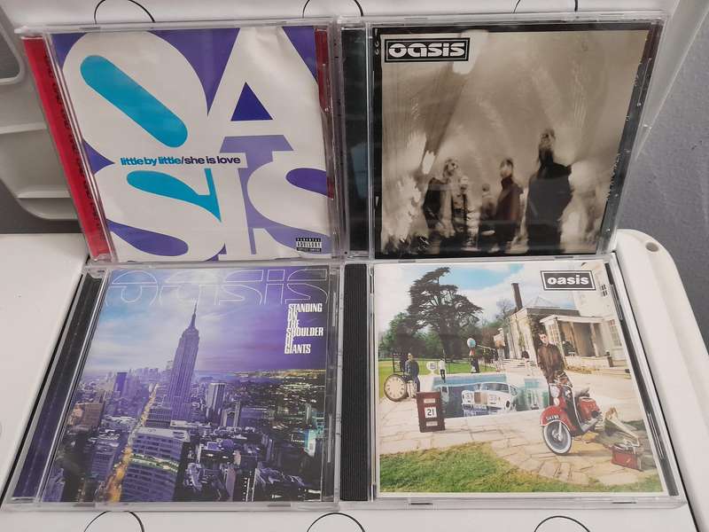 Oasis - CD Bundle & video documentary - Little by Little/ She is Love (CD & DVD)