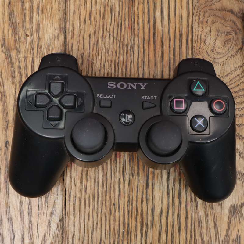 PS3 Console With a Controller - Remote - and Fourteen Games