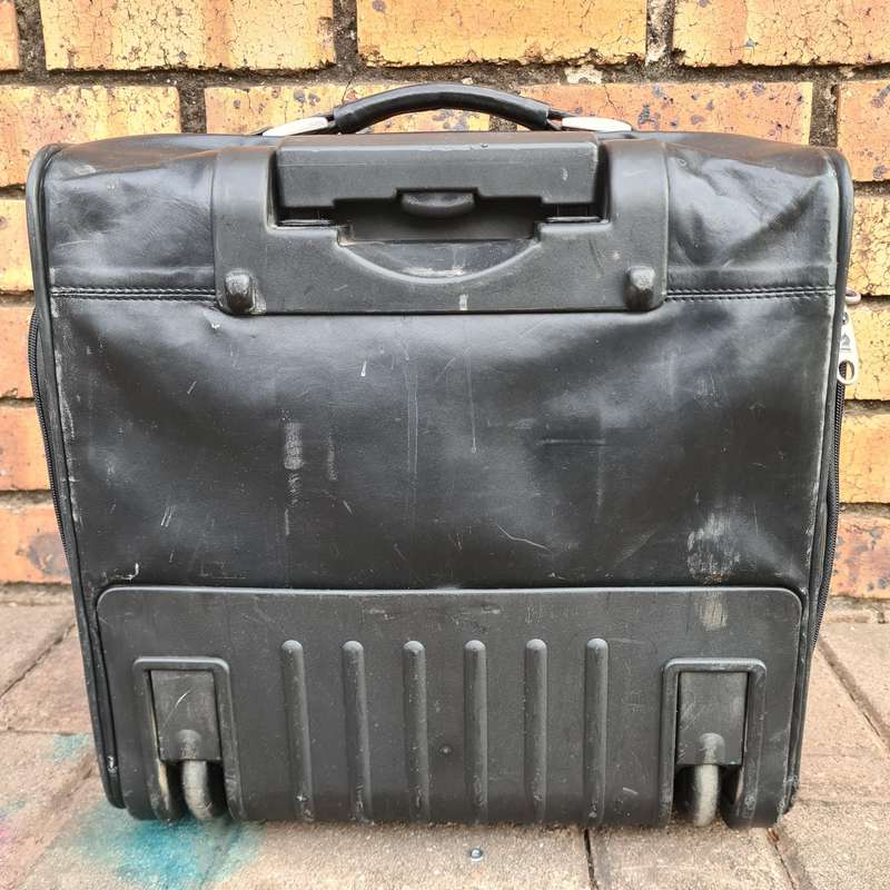 Ricardo Leather Carry-On Travel Bag with Rollers