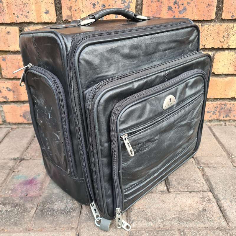 Ricardo Leather Carry-On Travel Bag with Rollers