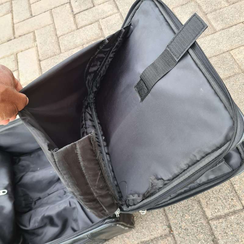 Ricardo Leather Carry-On Travel Bag with Rollers