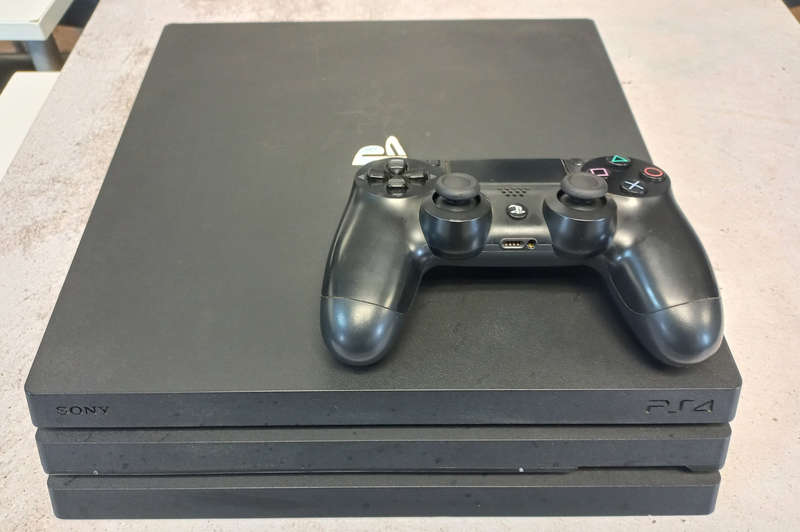 Sony PlayStation 4 Pro Console + 2 Games