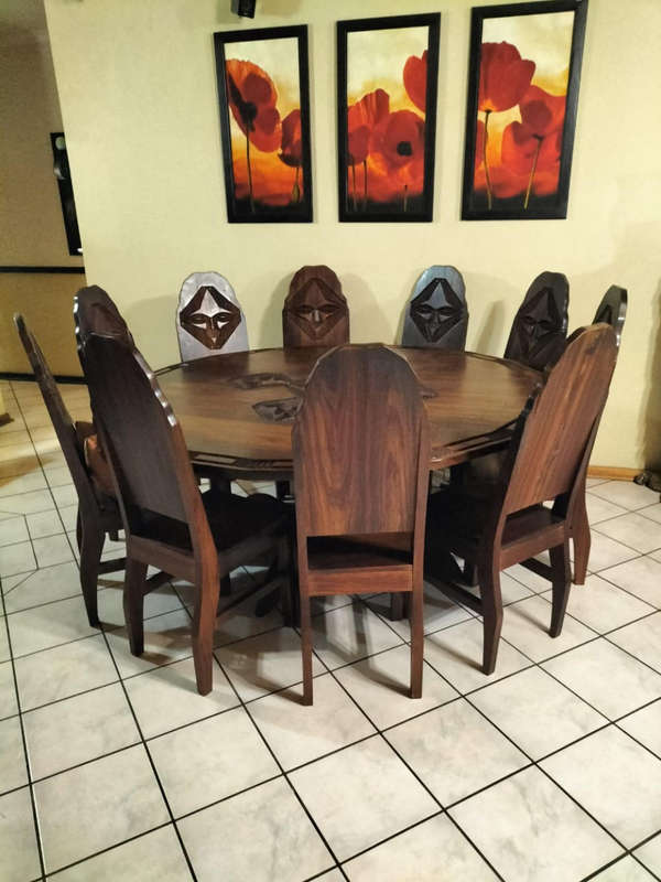 10 Seater dining suite plus 2 extra chairs