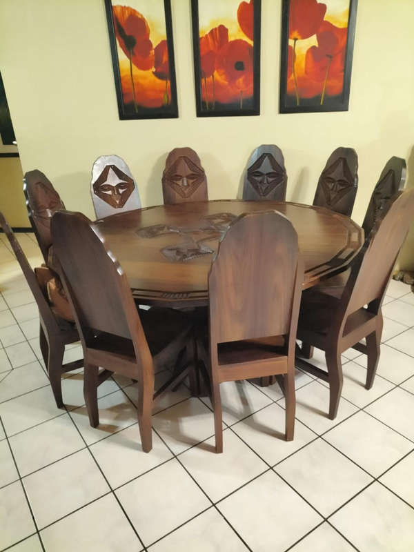 10 Seater dining suite plus 2 extra chairs