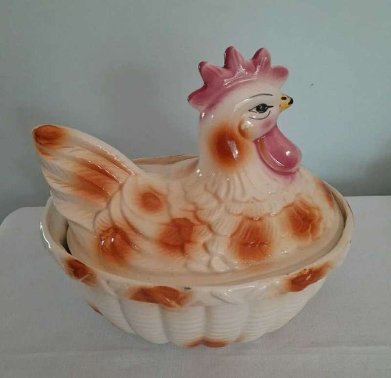 Vintage ceramic hen on a nest egg holder