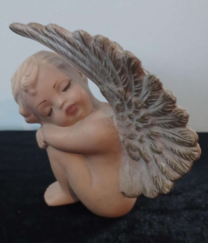 Vintage small ceramic baby angel in wings