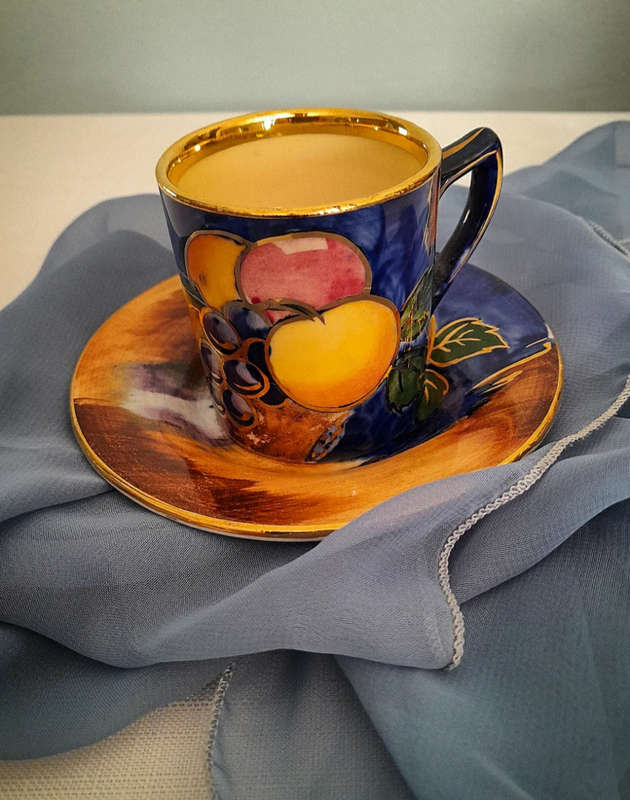 Antique H&K Tunstall " Luscious Marie Louise " demitasse cup and saucer