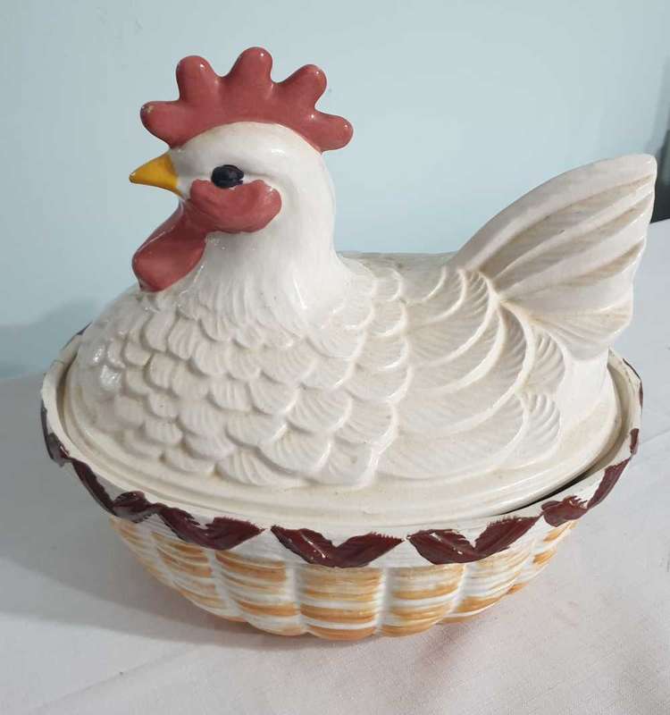 Vintage ceramic hen on a nest egg holder