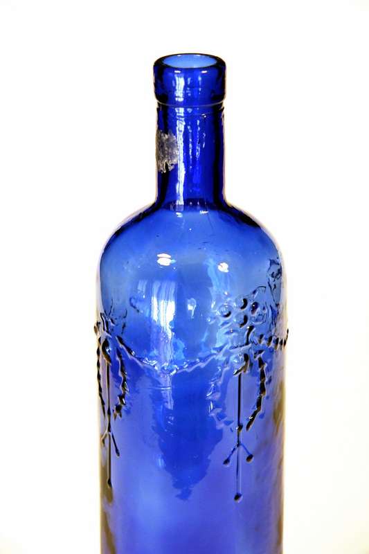 Vintage Decorated Wine Bottle, cobalt blue glass