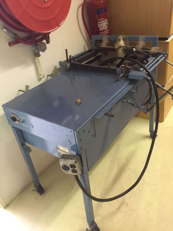 Heat Shrink tunnel and Packing table.
