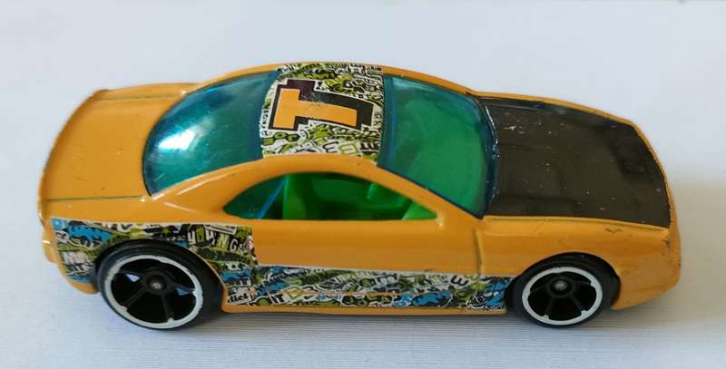 Racing car made in Malaysia 1,43 scale model: Metal die cast: Lovely condition: