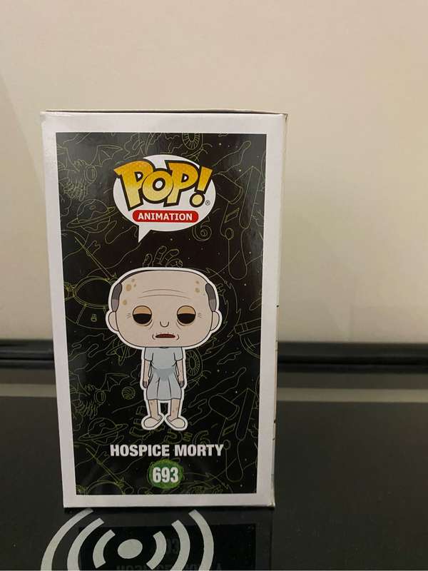 Signed David Angelo roman Morty funko pop with certificate of authenticity