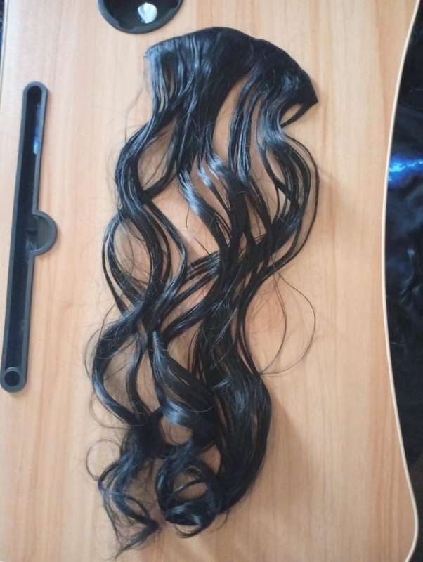 Clip-in real hair extensions brand new