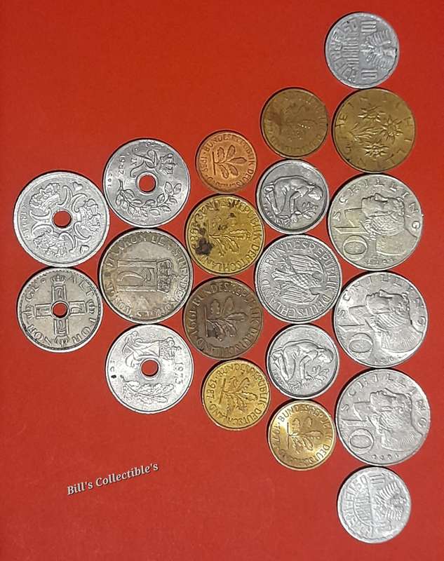 20 INTERNATIONAL COINS . 1 BID TAKES ALL .