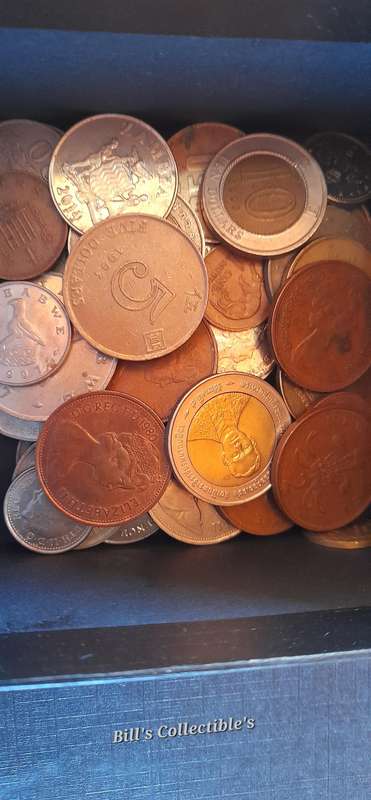 50 International Coins . Box Included.