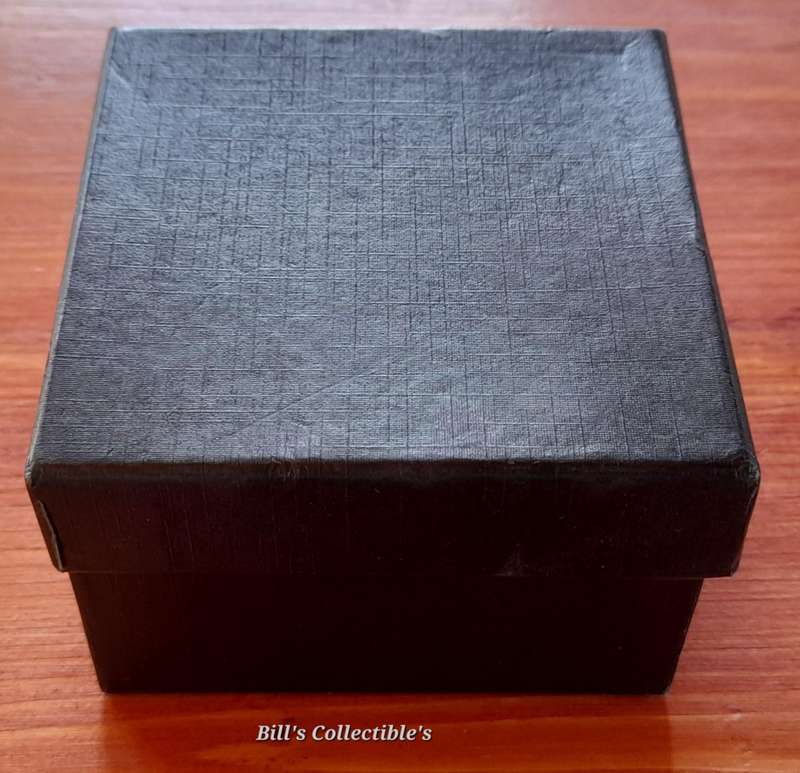 50 International Coins . Box Included.