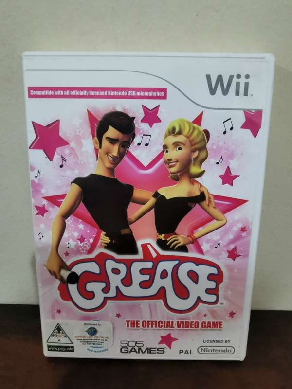 Grease on Nintendo Wii with booklet