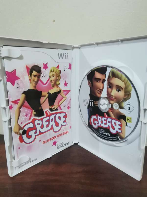 Grease on Nintendo Wii with booklet