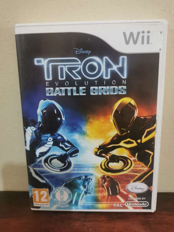 TRON - Evolution Battle Grids on Nintendo Wii with Booklet