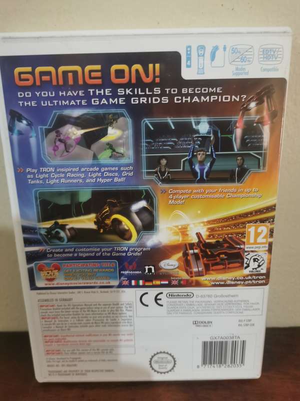 TRON - Evolution Battle Grids on Nintendo Wii with Booklet