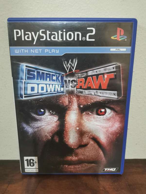 WWE Smack Down vs Raw with Booklet - Decent Condition