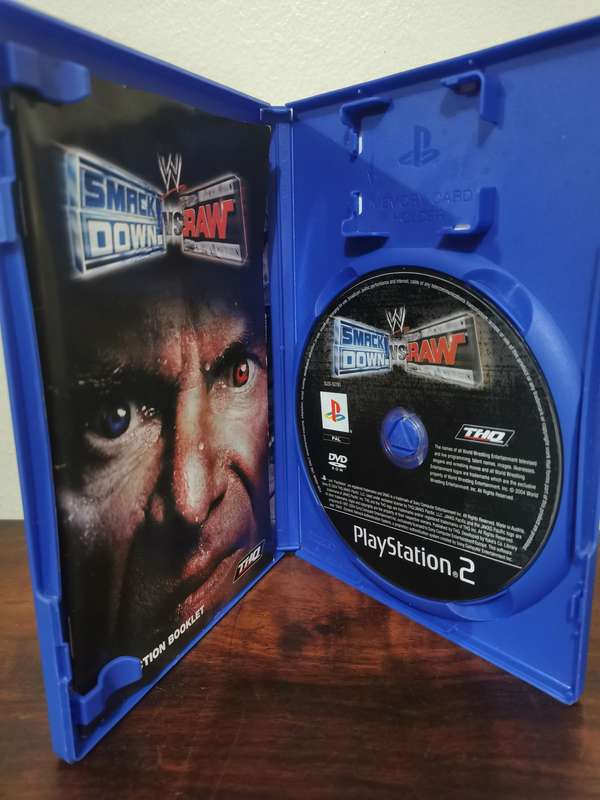 WWE Smack Down vs Raw with Booklet - Decent Condition