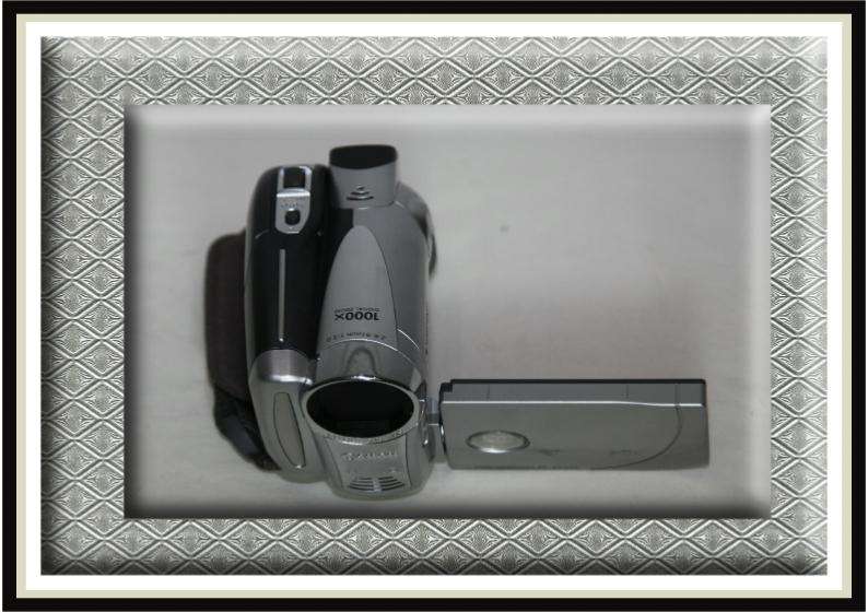 Mini DVD Camcorder and Camera (2 in 1) - Canon DC220.