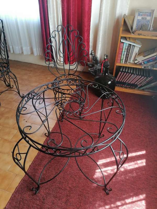 The Rod iron table and chairs