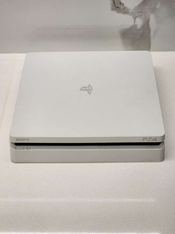 Sony PlayStation 4 Slim 500GB White Console Bundle + 2 Controllers + 7 Games