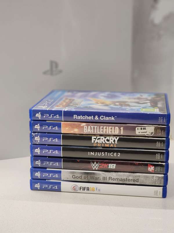 Sony PlayStation 4 Slim 500GB White Console Bundle + 2 Controllers + 7 Games