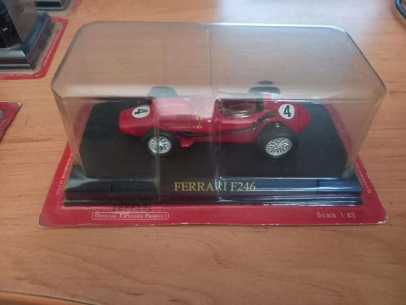 14 Ferrari die cast model cars + their magazines