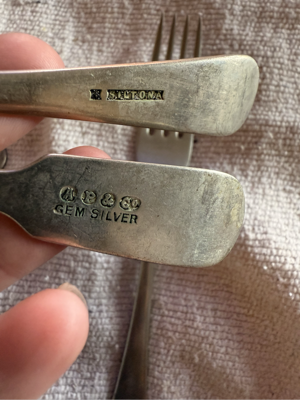 12 Sterling silver forks