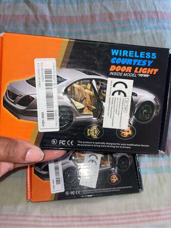 Wireless courtesy door LED