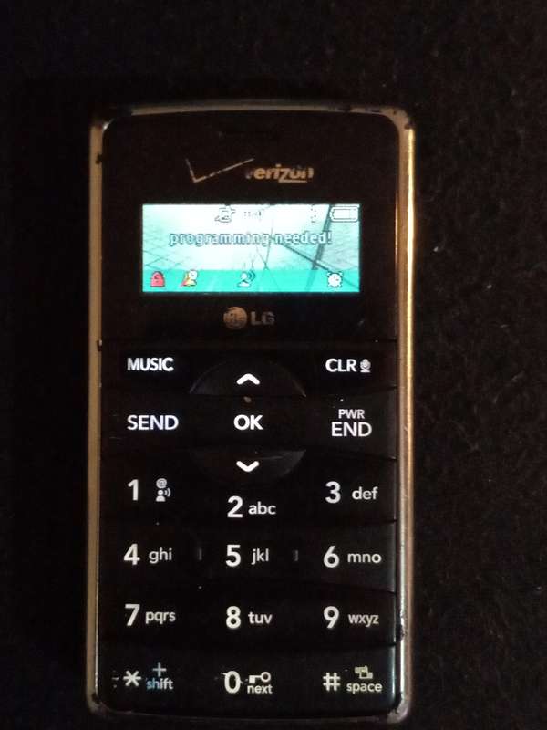 LGENV2X9100 flip open cell phone