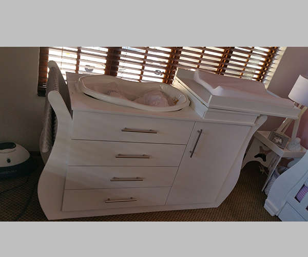 Nursery Baby cot and compactum with bath area